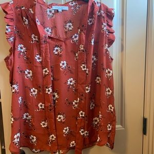 Woman’s sleeveless lightweight size 2x blouse.